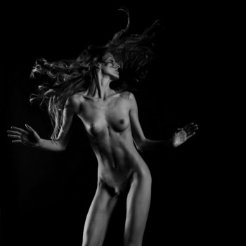black and white photographs of naked slim woman with flowing hair