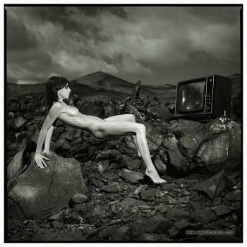 naked woman in a rocky environment