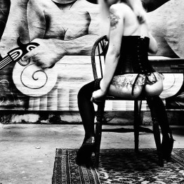 Erotic art photo of woman on chair