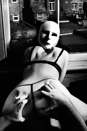Erotic art photo of woman with mask